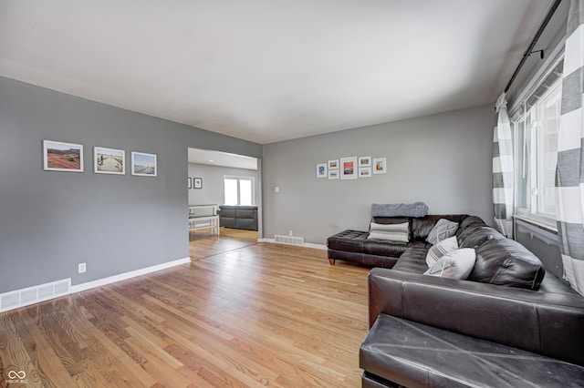 6143 Schoolwood Dr, Indianapolis, IN 46224 - living room with light wood-style flooring and baseboards