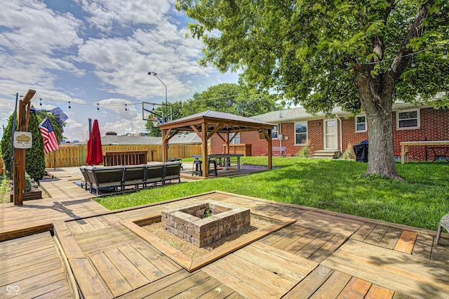 6143 Schoolwood Dr, Indianapolis, IN 46224 - deck featuring an outdoor fire pit, a gazebo, a fenced backyard, entry steps, and a swimming pool