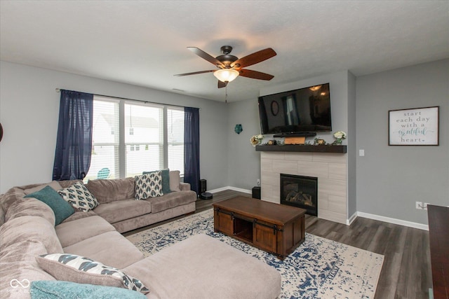 10334 Deercrest Ln, Indianapolis, IN 46239 - living room with a ceiling fan, dark wood-style floors, and a fireplace