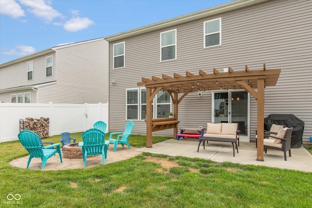 10334 Deercrest Ln, Indianapolis, IN 46239 - rear view of property with an outdoor living space with a fire pit, a fenced backyard, a pergola, and a patio