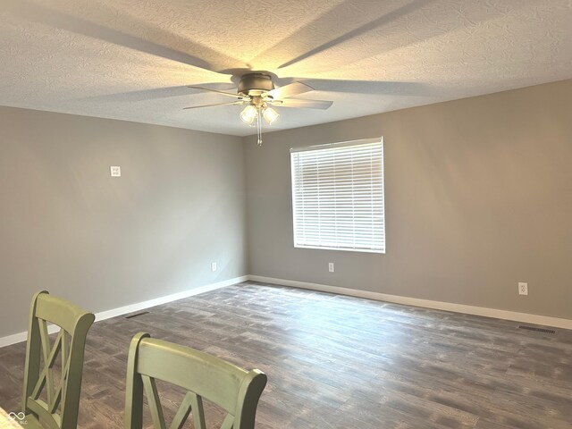 712 W Main St, Thorntown, IN 46071 - unfurnished room featuring ceiling fan, wood finished floors, and a textured ceiling