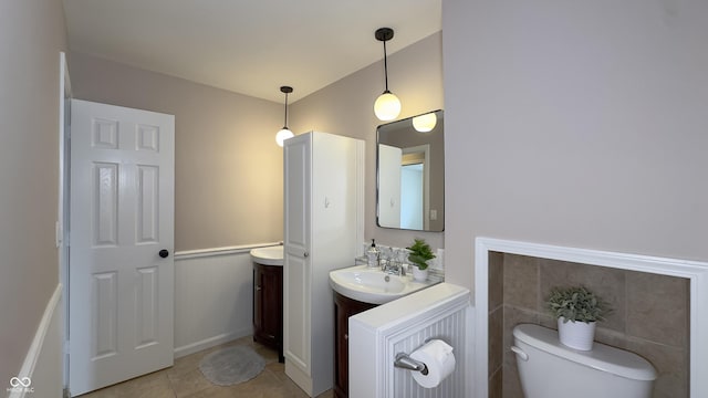 3019 E Berwyn St, Indianapolis, IN 46203 - bathroom with vanity and tile patterned floors