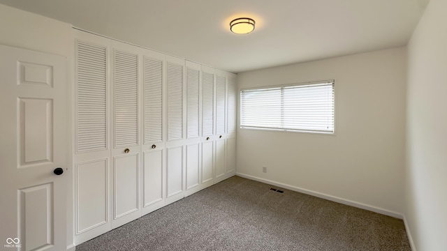 3019 E Berwyn St, Indianapolis, IN 46203 - unfurnished bedroom with carpet flooring and a closet