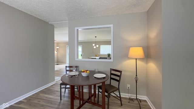 3019 E Berwyn St, Indianapolis, IN 46203 - dining area with wood finished floors and a textured ceiling