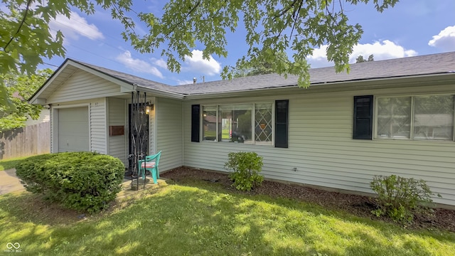3019 E Berwyn St, Indianapolis, IN 46203 - ranch-style home featuring an attached garage