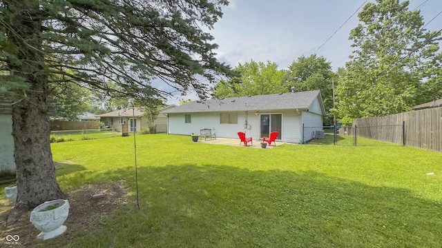 3019 E Berwyn St, Indianapolis, IN 46203 - back of house featuring a fenced backyard and a patio area