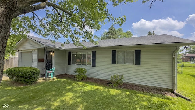 3019 E Berwyn St, Indianapolis, IN 46203 - ranch-style home featuring roof with shingles and a garage