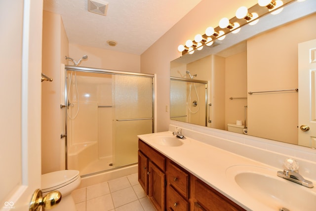 6965 Steinmeier Dr W, Indianapolis, IN 46220 - full bath featuring a stall shower, tile patterned flooring, double vanity, and a textured ceiling