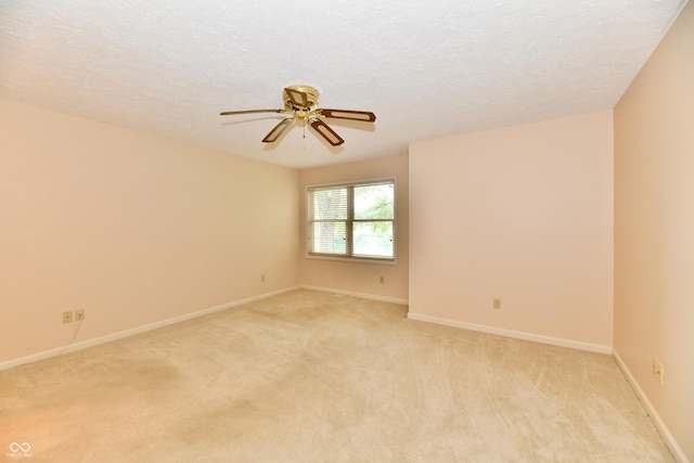 6965 Steinmeier Dr W, Indianapolis, IN 46220 - unfurnished room featuring light colored carpet, a ceiling fan, and a textured ceiling