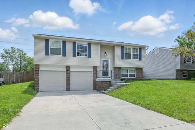 5503 Antoneli Ln, Indianapolis, IN 46237 - split foyer home featuring brick siding, driveway, and an attached garage