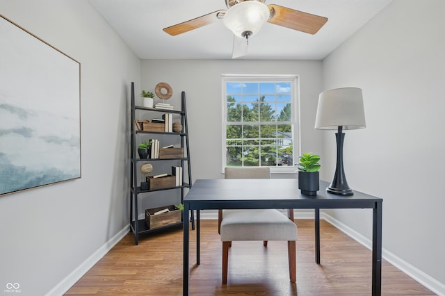 5503 Antoneli Ln, Indianapolis, IN 46237 - office area with light wood-style floors and ceiling fan