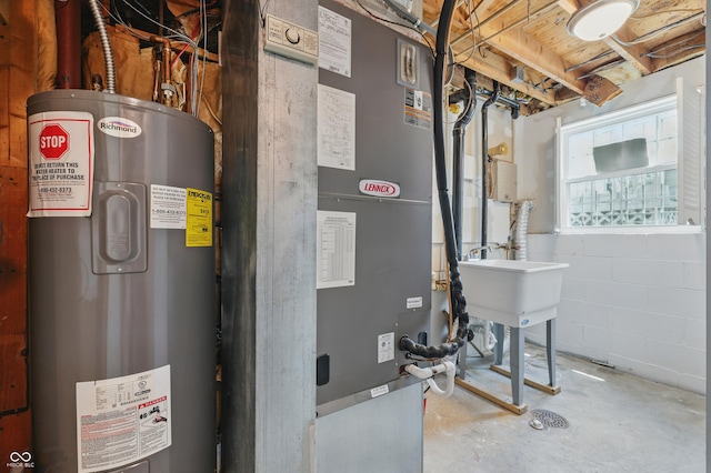 5503 Antoneli Ln, Indianapolis, IN 46237 - utility room with electric water heater and heating unit