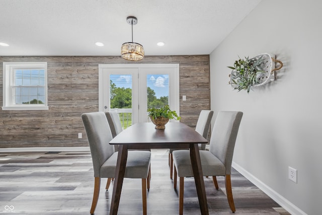 5503 Antoneli Ln, Indianapolis, IN 46237 - dining room with a chandelier, wood walls, plenty of natural light, wood finished floors, and recessed lighting