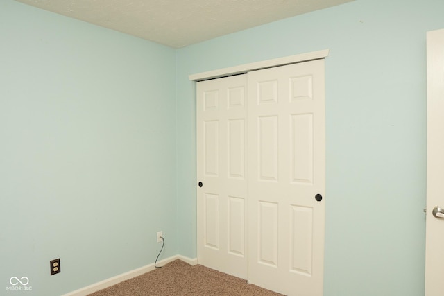 6585 Dunsdin Dr, Plainfield, IN 46168 - unfurnished bedroom featuring carpet and a closet