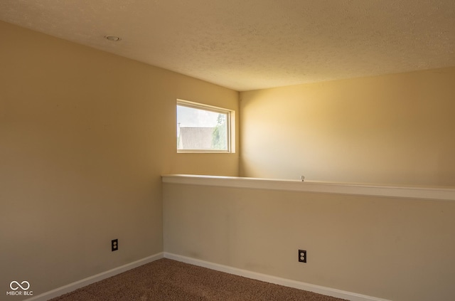 6585 Dunsdin Dr, Plainfield, IN 46168 - unfurnished room featuring carpet flooring and a textured ceiling