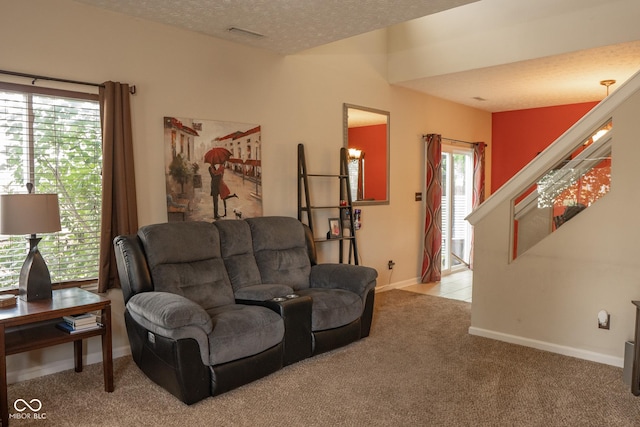 6585 Dunsdin Dr, Plainfield, IN 46168 - living room with light colored carpet and a textured ceiling