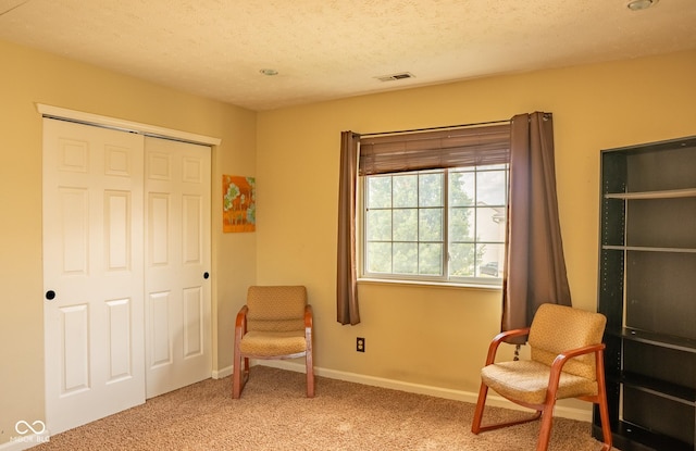 6585 Dunsdin Dr, Plainfield, IN 46168 - living area featuring light carpet and a textured ceiling