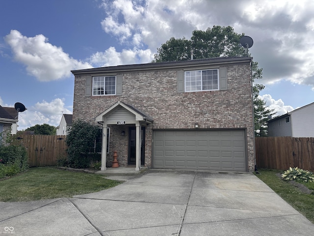 6585 Dunsdin Dr, Plainfield, IN 46168 - traditional-style house with a garage, brick siding, and concrete driveway