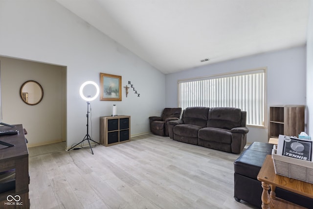 8038 Midlothian Way, Indianapolis, IN 46214 - living area featuring light wood-type flooring and high vaulted ceiling