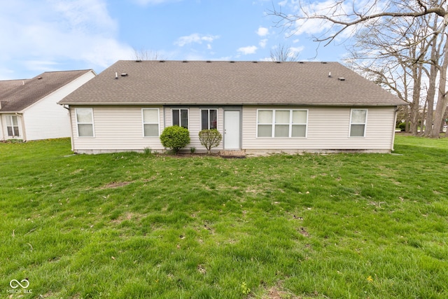8038 Midlothian Way, Indianapolis, IN 46214 - back of property featuring a lawn and roof with shingles