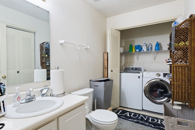 8038 Midlothian Way, Indianapolis, IN 46214 - bathroom with independent washer and dryer, a closet, and vanity