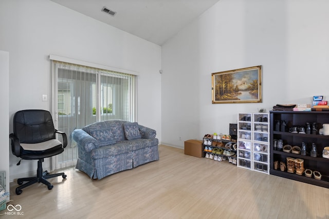 8038 Midlothian Way, Indianapolis, IN 46214 - living area featuring wood finished floors and a towering ceiling