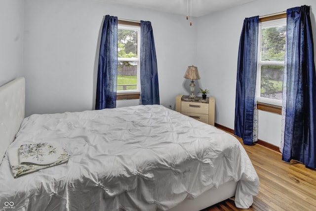 241 Wehmeier St, Columbus, IN 47201 - bedroom with wood finished floors and baseboards