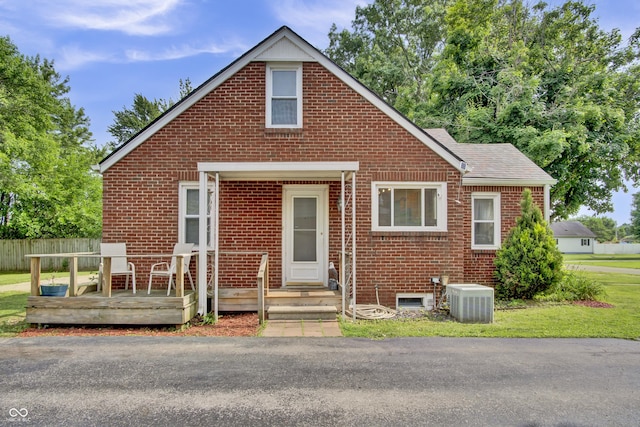 241 Wehmeier St, Columbus, IN 47201 - bungalow-style home featuring brick siding and roof with shingles