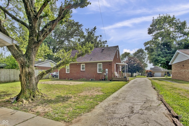 241 Wehmeier St, Columbus, IN 47201 - view of property exterior with brick siding, driveway, and a shingled roof