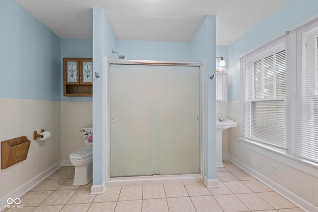 113 N Munsie St, Indianapolis, IN 46229 - bathroom with tile patterned floors and a stall shower