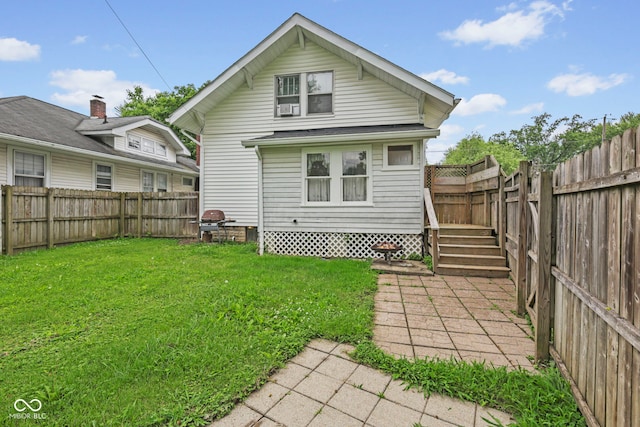113 N Munsie St, Indianapolis, IN 46229 - rear view of property featuring a fenced backyard