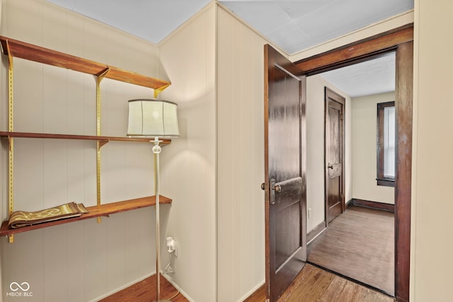 113 N Munsie St, Indianapolis, IN 46229 - hallway with wood finished floors and baseboards