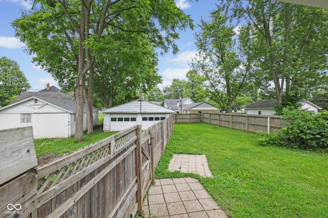 113 N Munsie St, Indianapolis, IN 46229 - fenced backyard featuring an outdoor structure