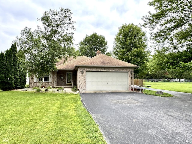 526 Jefferson Vly, Coatesville, IN 46121 - ranch-style house featuring asphalt driveway, an attached garage, and brick siding