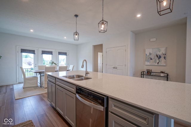 9728 Junction, Fishers, IN 46037 - kitchen featuring dishwasher, recessed lighting, dark wood finished floors, light stone countertops, and decorative light fixtures