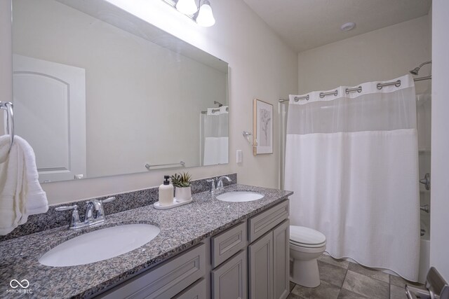 9728 Junction, Fishers, IN 46037 - bathroom with double vanity and shower / tub combo with curtain