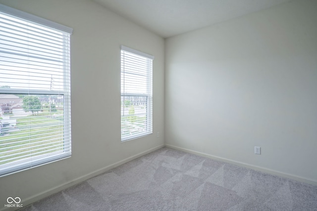 9728 Junction, Fishers, IN 46037 - spare room featuring light carpet and baseboards