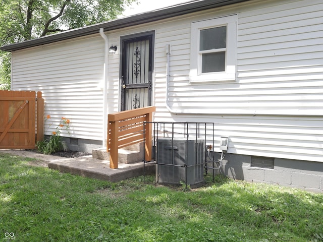 4445 Kingsley Dr, Indianapolis, IN 46205 - view of exterior entry featuring crawl space
