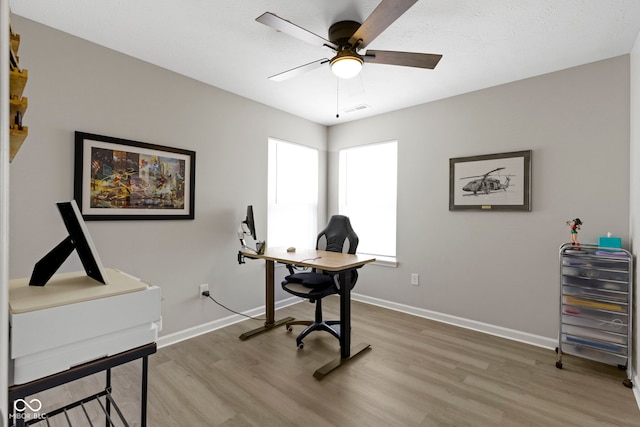 2733 Lamar Dr, Whitestown, IN 46075 - office area with wood finished floors and a ceiling fan
