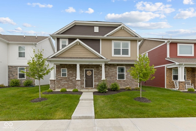 2733 Lamar Dr, Whitestown, IN 46075 - view of front facade with a front lawn, a porch, and stone siding