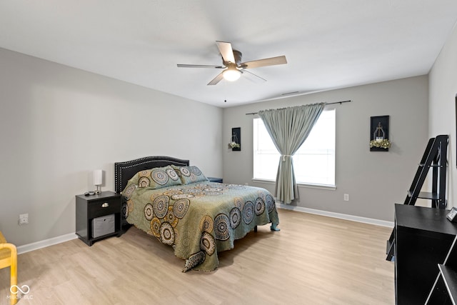 2733 Lamar Dr, Whitestown, IN 46075 - bedroom with light wood finished floors and ceiling fan
