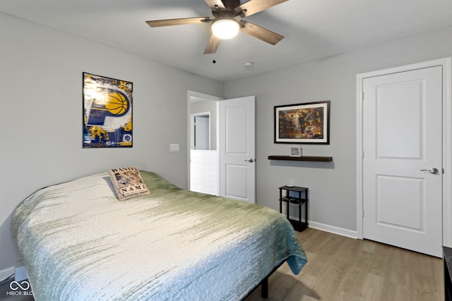 2733 Lamar Dr, Whitestown, IN 46075 - bedroom featuring light wood finished floors and ceiling fan