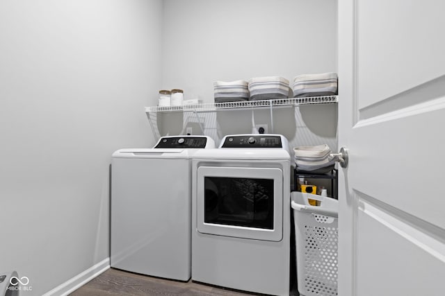 2733 Lamar Dr, Whitestown, IN 46075 - washroom with washing machine and clothes dryer and wood finished floors