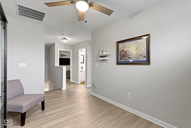 2733 Lamar Dr, Whitestown, IN 46075 - living area with light wood-type flooring and ceiling fan