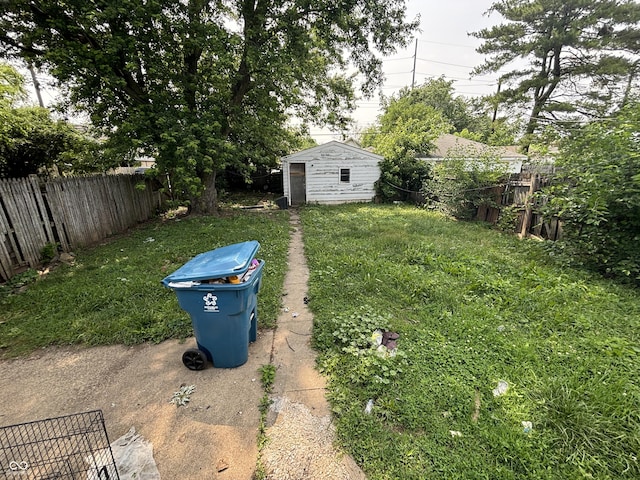 1226 Hiatt St, Indianapolis, IN 46221 - fenced backyard with an outbuilding