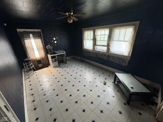 1226 Hiatt St, Indianapolis, IN 46221 - spare room with a ceiling fan and light floors
