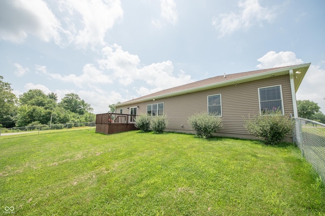 8090 N State Highway 7, Elizabethtown, IN 47232 - fenced backyard with a deck