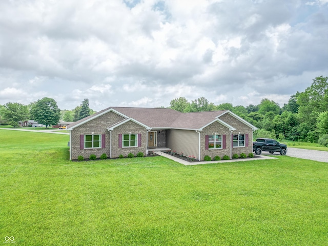 8090 N State Highway 7, Elizabethtown, IN 47232 - ranch-style home with brick siding and a front lawn