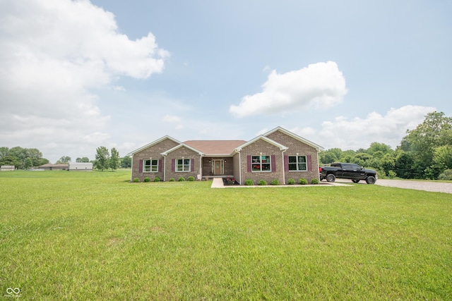 8090 N State Highway 7, Elizabethtown, IN 47232 - ranch-style home featuring a front yard and brick siding