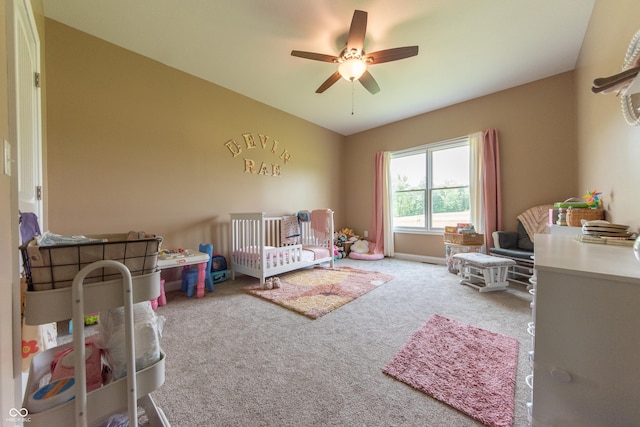 8090 N State Highway 7, Elizabethtown, IN 47232 - carpeted bedroom featuring a crib and ceiling fan